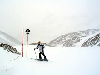 A rest on the black piste T.